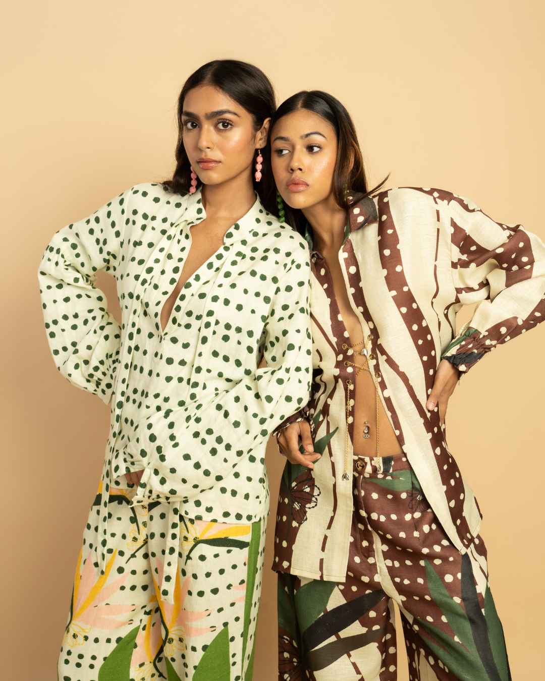 Two women in printed co-ord sets